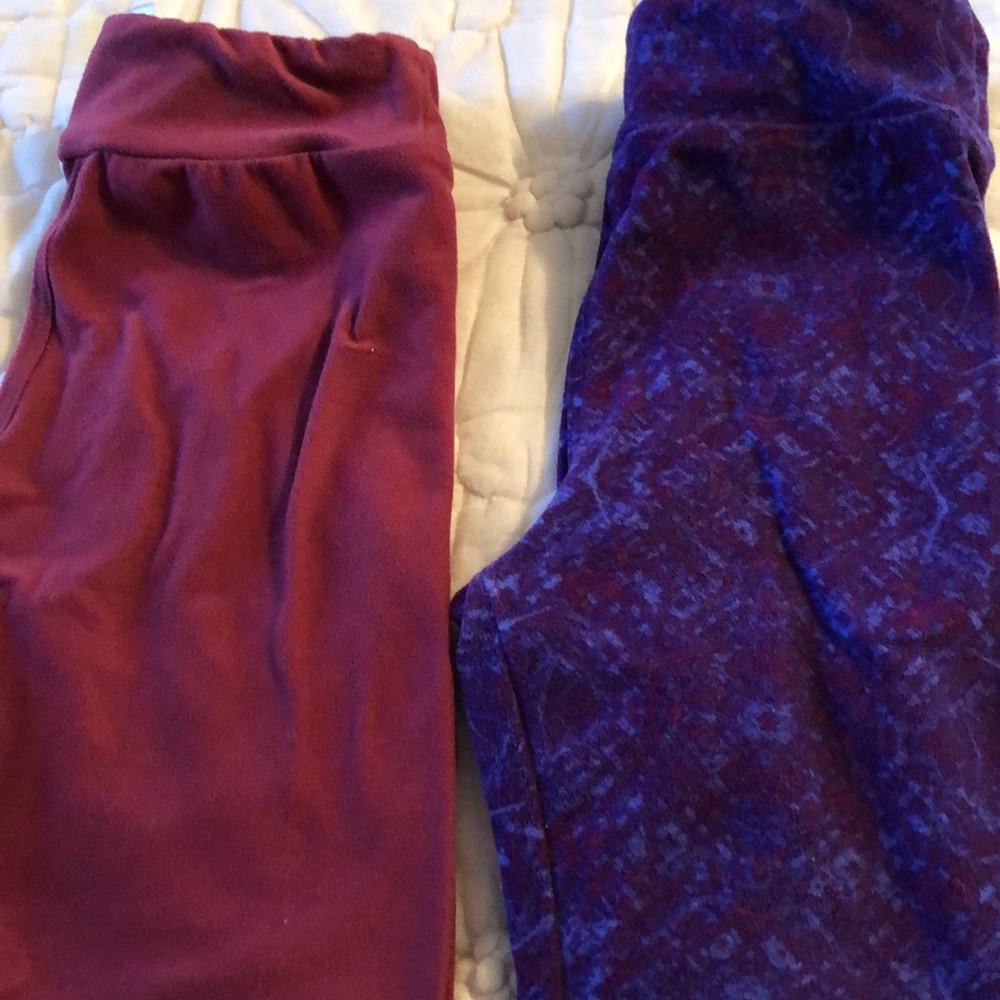 Pair of S/M printed and solid Lularoe Leggings